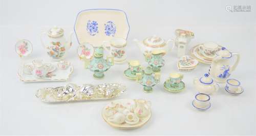 A group of miniature tea sets to include a Wedgwood example