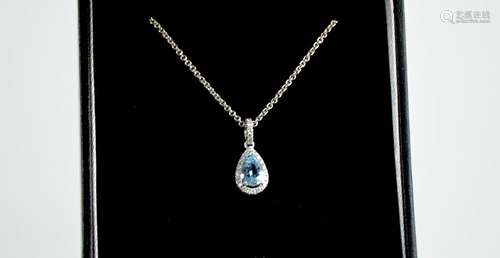 An 18ct white gold, aquamarine and diamond pendant, with 18c...