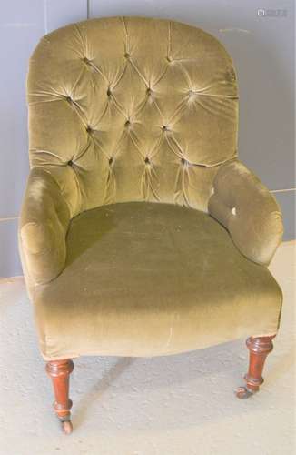 A Victorian button backed armchair, in green dralon. 92cm ov...