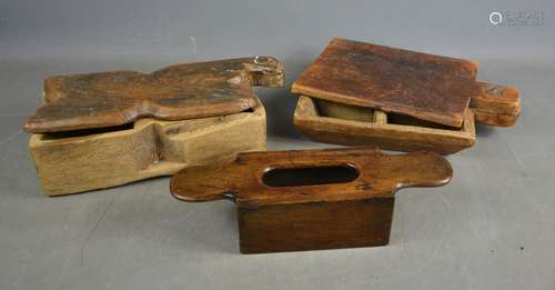 Three antique treen boxes, two with swivel tops.