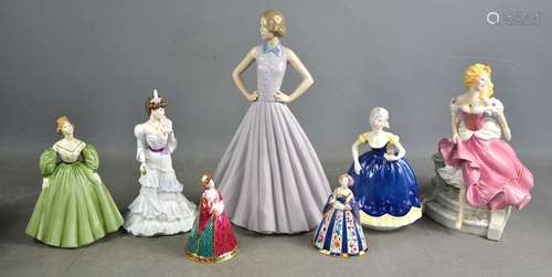 A group of porcelain figurines, to include Nao, Royal Worces...