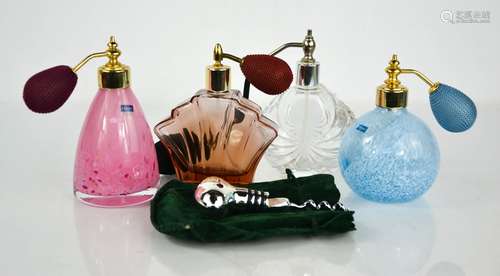 A group of glass perfume atomisers.