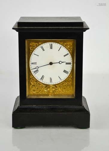 A Victorian French mantle clock with Roman numeral dial, ebo...