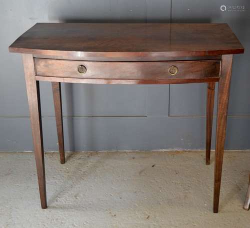 A 19th century mahogany bow fronted side table, tapered legs...