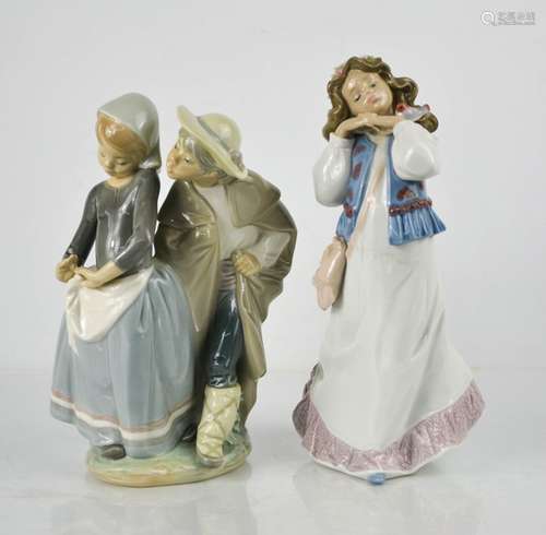 Two Lladro porcelain figurines: Gypsy girl Lladro Event Figu...