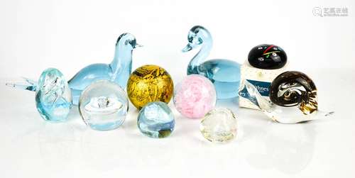 A group of glass paperweights, including Caithness and signe...