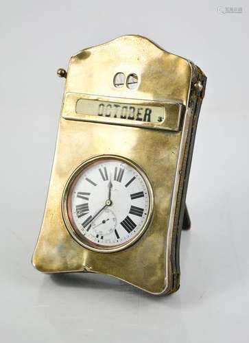 A silver desk calendar pocket watch holder, containing pocke...