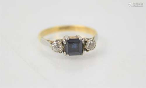 A 9ct gold ring with sapphire and diamonds set in a platinum...