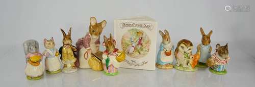 A group of Beswick Beatrix Potter figurines.