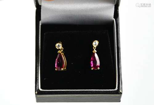 A pair of rubellite and diamond earrings, the rubellite 2.48...