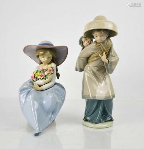 Two Lladro figurines, one titled Fragrant Bouquet and signed...