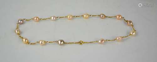 A 9ct gold figaro chain with pink hue baroque pearls, 46cm l...