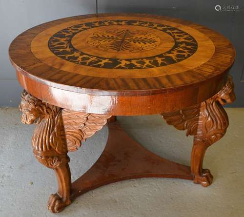 An Art Deco period fiddleback mahogany and marquetry circula...