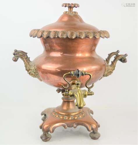 A 19th century copper samovar, twin-handled, with brass tap ...