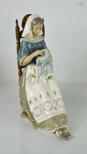 A large Lladro figurine titled Embroiderer, lady sewing, 486...