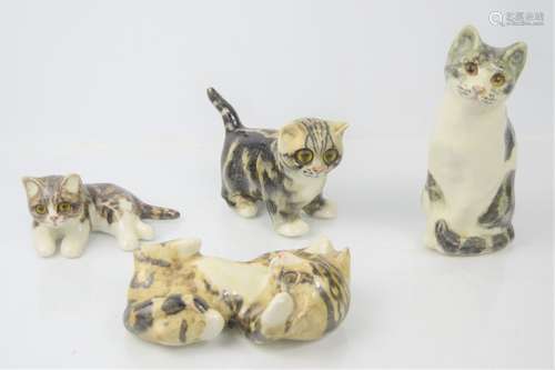 A group of Winstanley pottery cats