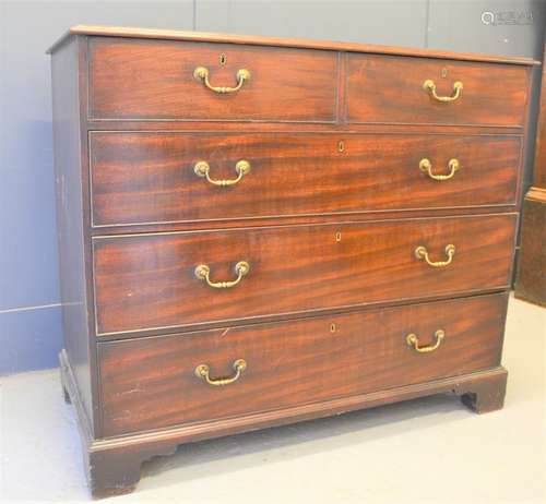 A Georgian Cuban mahogany chest of drawers raised on bracket...