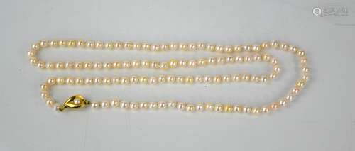 A 9ct yellow cultured pearl necklace with a gold and pearl c...