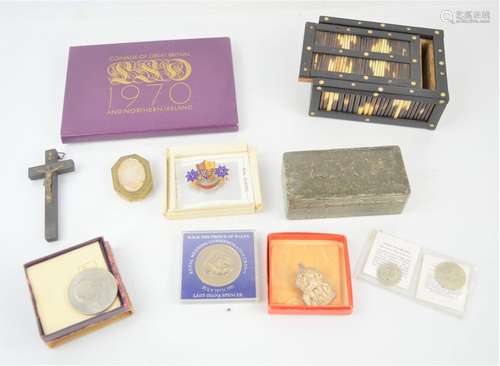 A group of collectibles to include, commemorative coins, sil...