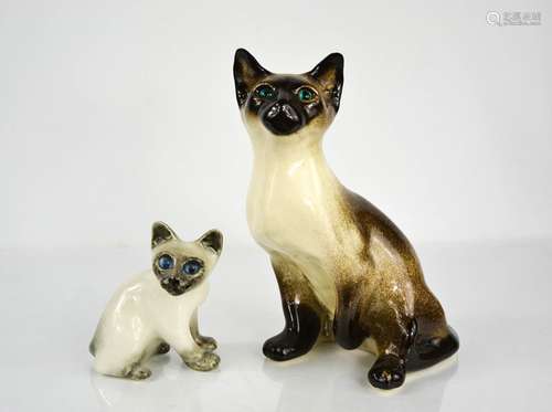 Two Winstanley pottery cats, both signed to the bases, the t...