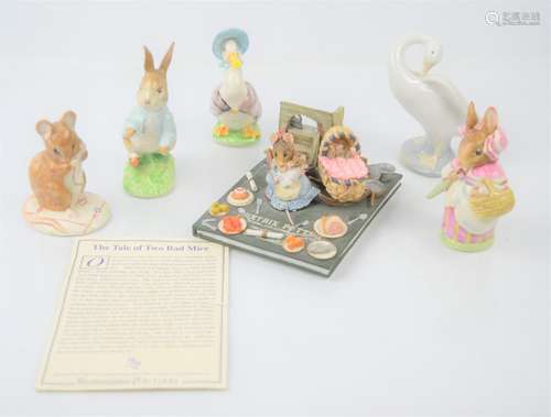 A group of Beswick and Royal Albert Beatrix potter character...