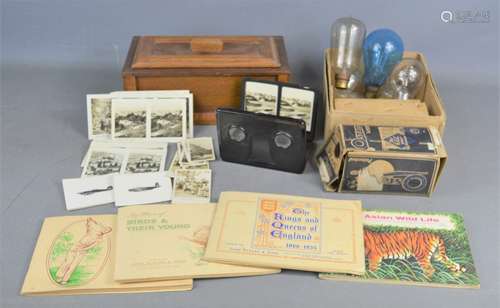 A group of cigarette cards in albums and loose together with...