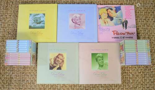 A collection of five Doris Day Cd boxsets with books by Bear...