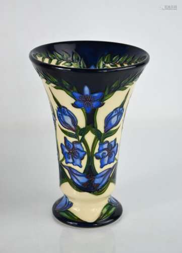 A Moorcroft vase in the Kaffir Lily pattern, designed by Shi...
