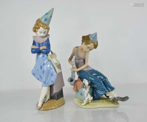 Two Lladro porcelain figurines; Girl With Trumpet and Girl w...