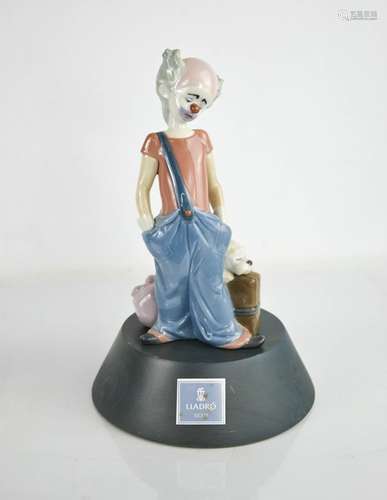 A Lladro porcelain clown on stand, limited edition, signed t...