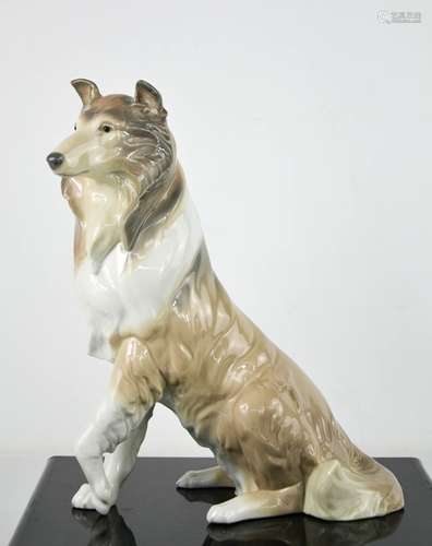 A Lladro porcelain collie dog, 6455, 25cm high.