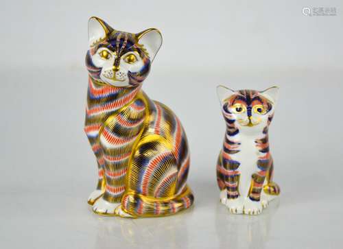 Two Royal Crown Derby cats, LII and LXI 8cm high.