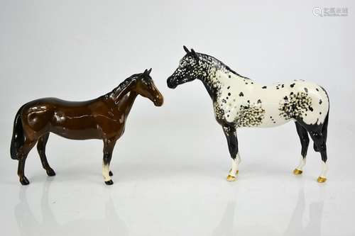 Two Beswick porcelain horses: an Appaloosa Stallion and a br...