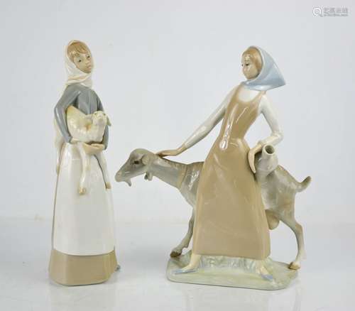 Two Lladro porcelain figurines: Girl with Lamb and Girl with...