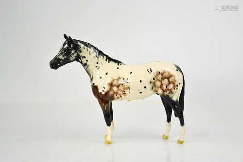 A Beswick porcelain Appaloosa Stallion, together with the or...