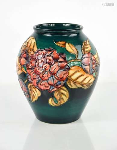 A Moorcroft vase by D J Hancock, signed to the base, no. 5, ...