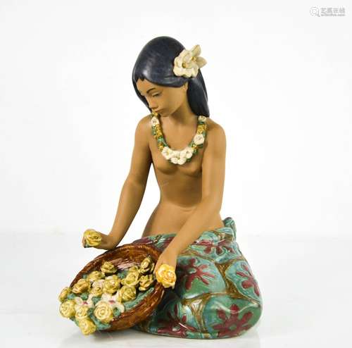 A Lladro porcelain Hawaiian girl with basket of flowers, 26c...