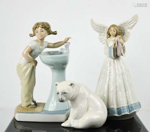 Three Lladro porcelain figurines: Polar Bear Cub, Angel and ...