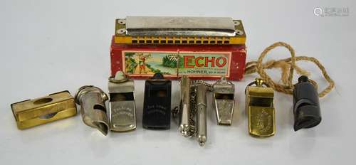 An Echo Hohner harmonica with original box, together with a ...