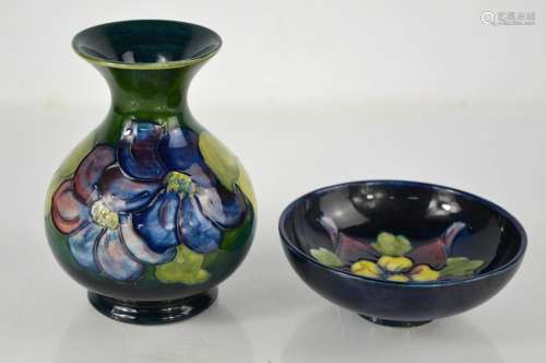 A Moorcroft dish together with a Moorcroft vase in the peony...