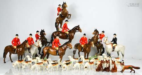 A rare Beswick porcelain hunting set, comprising four foxes ...