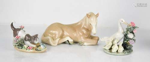 A Lladro porcelain pony, a duck with ducklings & snail, and ...