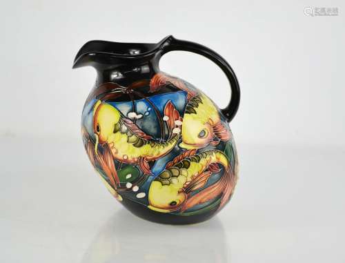 A Moorcroft Jug titled Fishing Around, a limited edition exa...