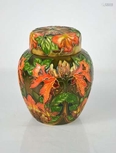 A Moorcroft ginger jar and cover in the Flames of the Forest...