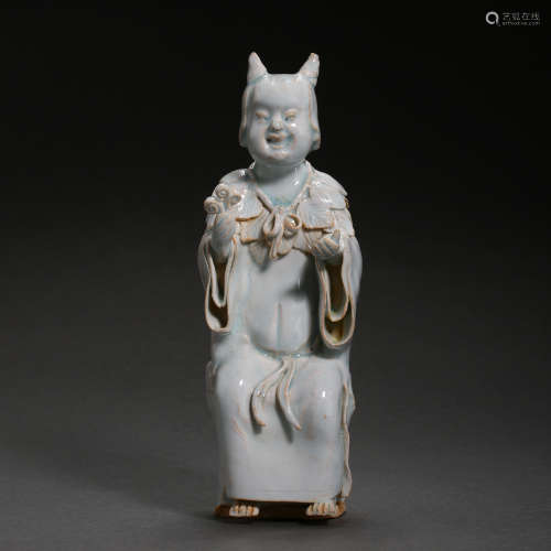 HUTIAN WARE SEATED CELADON BOY FIGURE, SONG DYNASTY, CHINA
