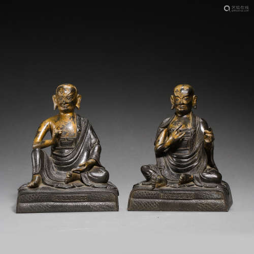 A PAIR OF GILT BRONZE BUDDHA SEATED STATUES, MING DYNASTY, C...