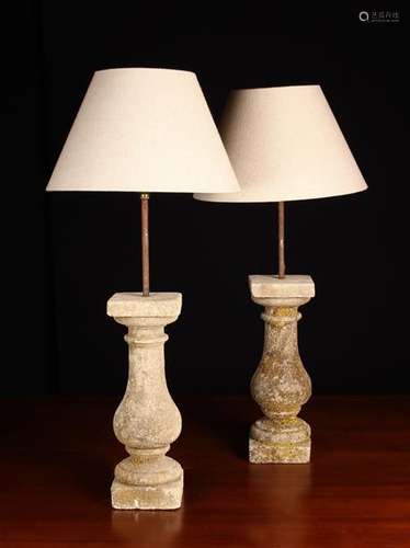 A Pair of Side Lamps composed of stone balusters mounted wit...