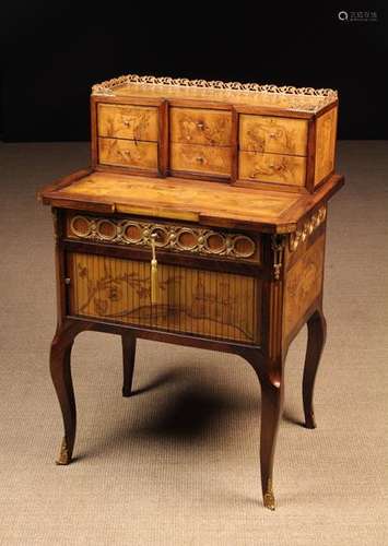 A Small Inlaid Bonheur du Jour richly decorated with penwork...