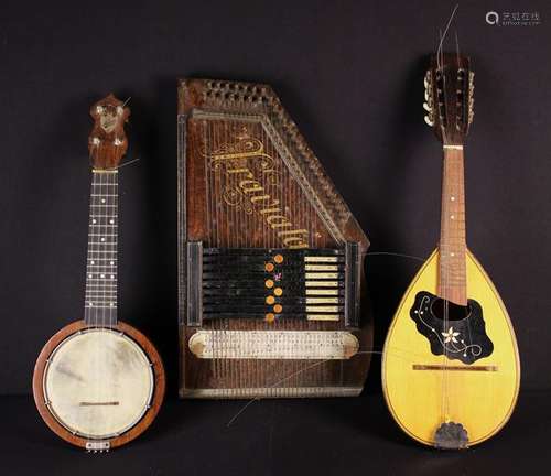 A Vintage Banjo Ukulele, Lute and Zither.