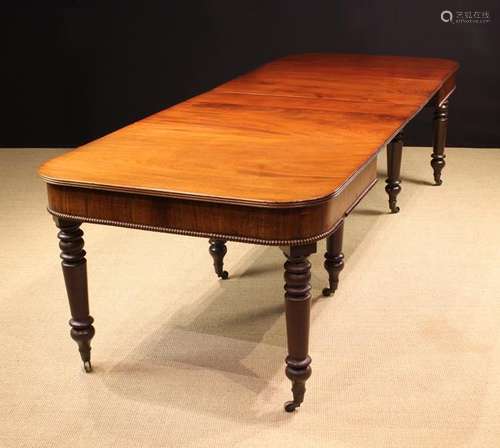 A Gillows Style Mahogany Extending Dining Table.